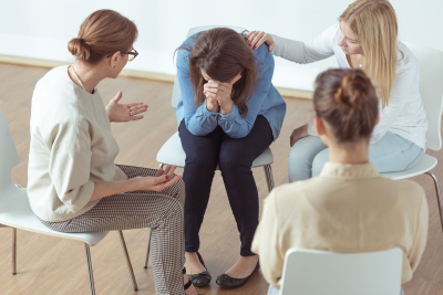 woman crying during group therapy